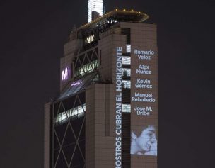 Torre Telefónica proyecta rostro de personas fallecidas en manifestaciones e incita a la paz