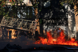 En prisión preventiva pareja imputada por incendio en sucursal de BancoEstado