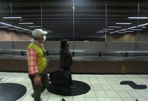 FOTOS | Instalan malla de seguridad en estación Baquedano de Metro