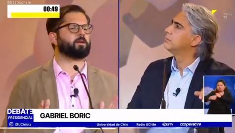 “Hablemos de cobardía con el cuarto retiro”: Boric y ME-O tuvieron duro cruce de palabras en debate de la U. de Chile
