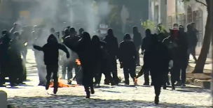 Disturbios en Liceo de Aplicación: Encapuchados lanzaron objetos contundentes a Carabineros