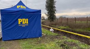 Encuentran a hombre decapitado y maniatado de pies y manos en canal de Buin